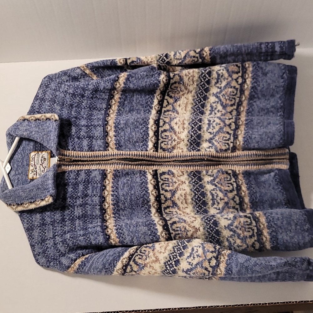 Sweater. Zip up. Collared.